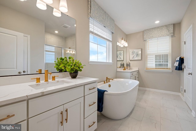 bathroom with plus walk in shower and vanity