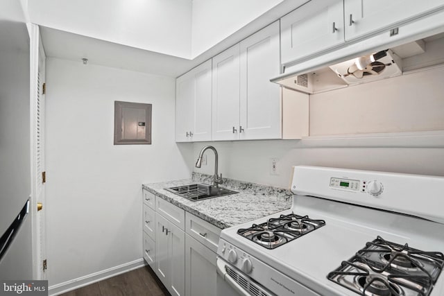 kitchen with dark hardwood / wood-style flooring, sink, electric panel, white cabinetry, and white gas stove