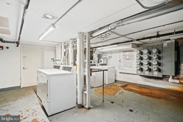 basement with washer and clothes dryer