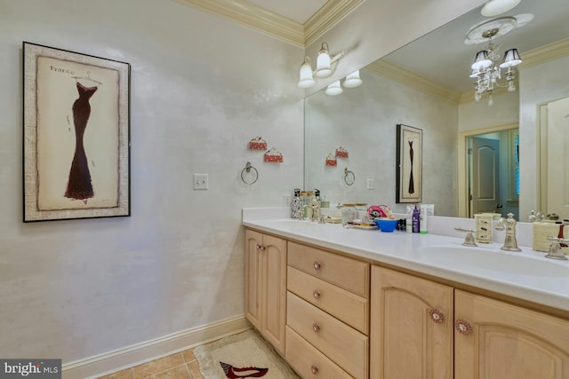 bathroom with ornamental molding, vanity, and tile patterned floors