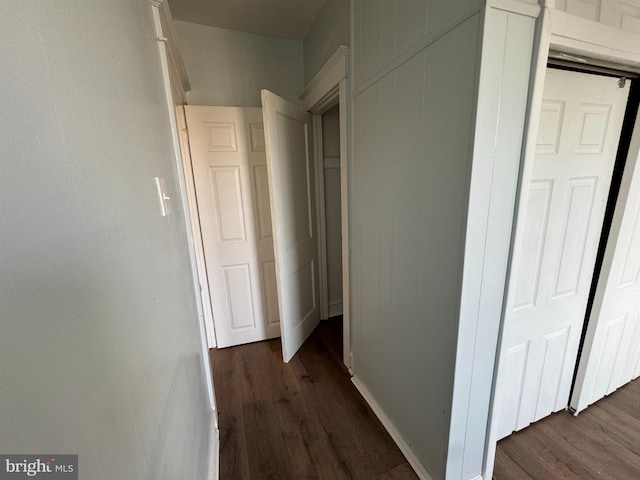 hallway featuring dark hardwood / wood-style floors