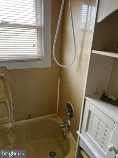 bathroom featuring tub / shower combination