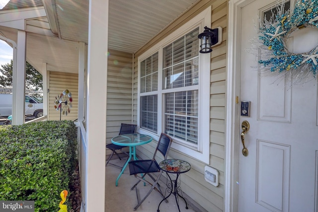 entrance to property featuring covered porch