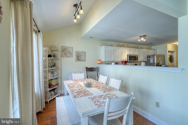 dining space featuring dark hardwood / wood-style floors