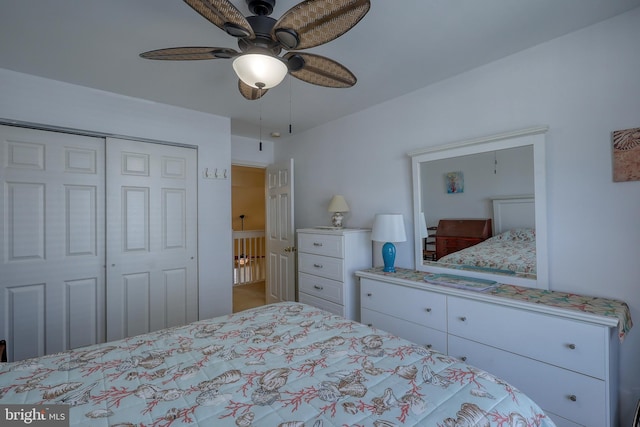 bedroom featuring ceiling fan and a closet