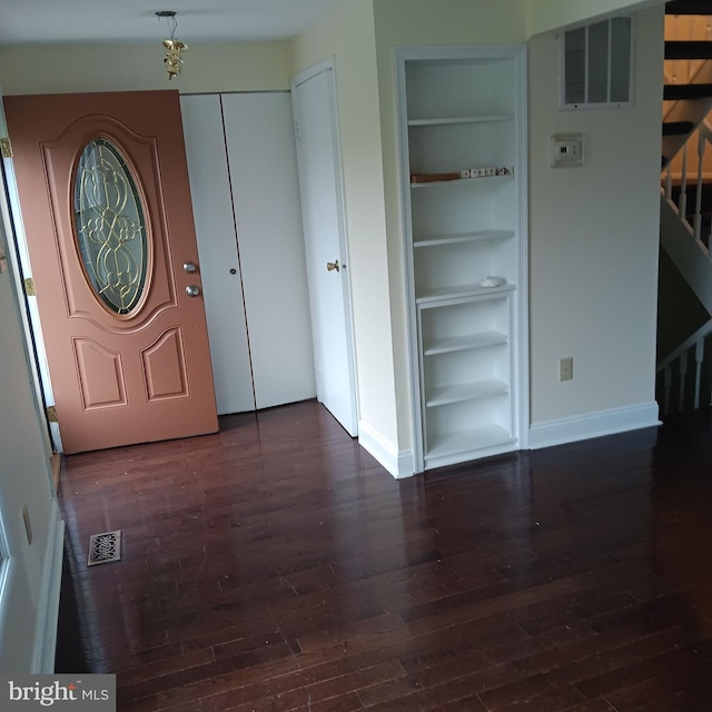 entrance foyer with dark wood-type flooring