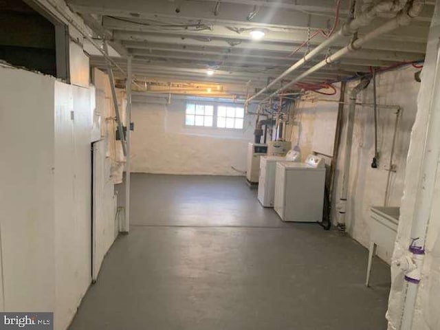 basement featuring separate washer and dryer