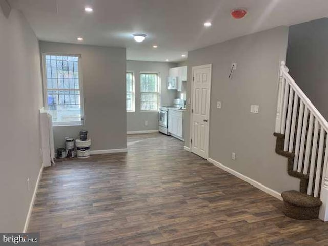 foyer entrance with dark wood-type flooring