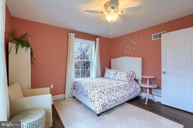 bedroom with wood-type flooring and ceiling fan