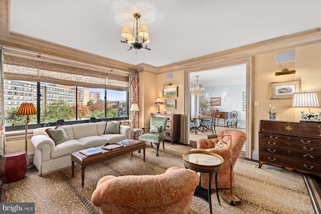 living room with an inviting chandelier and crown molding