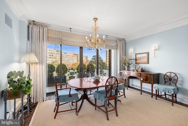 dining space with an inviting chandelier and crown molding