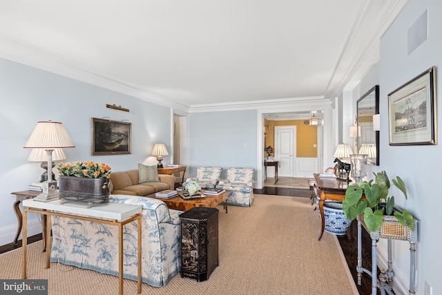 living room featuring crown molding