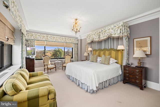 carpeted bedroom featuring a chandelier and ornamental molding