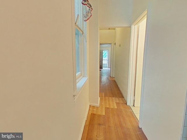 corridor featuring light wood-type flooring