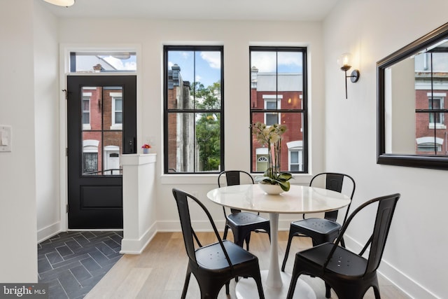 dining space featuring hardwood / wood-style flooring