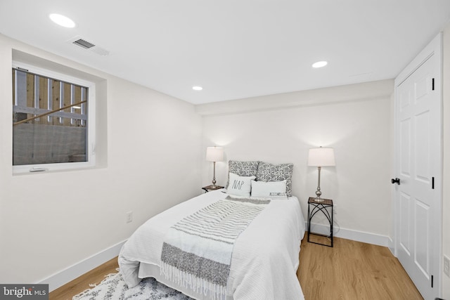 bedroom featuring light hardwood / wood-style floors