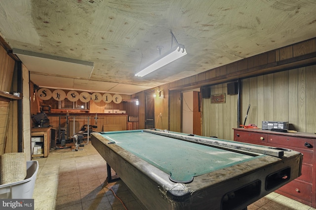 rec room featuring pool table and wooden walls