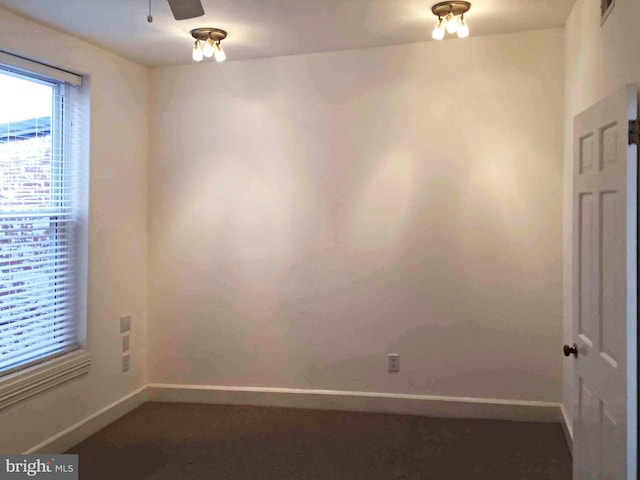 unfurnished room with ceiling fan