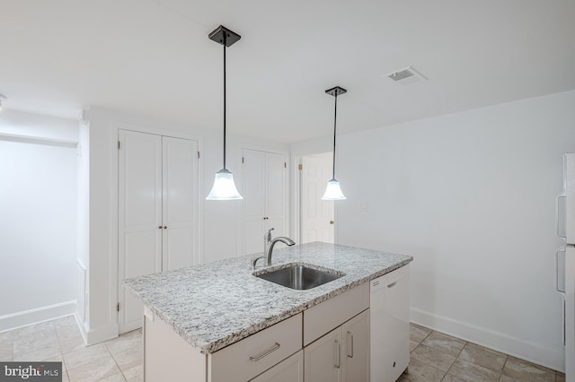 kitchen featuring pendant lighting, dishwasher, a kitchen island with sink, sink, and white cabinets