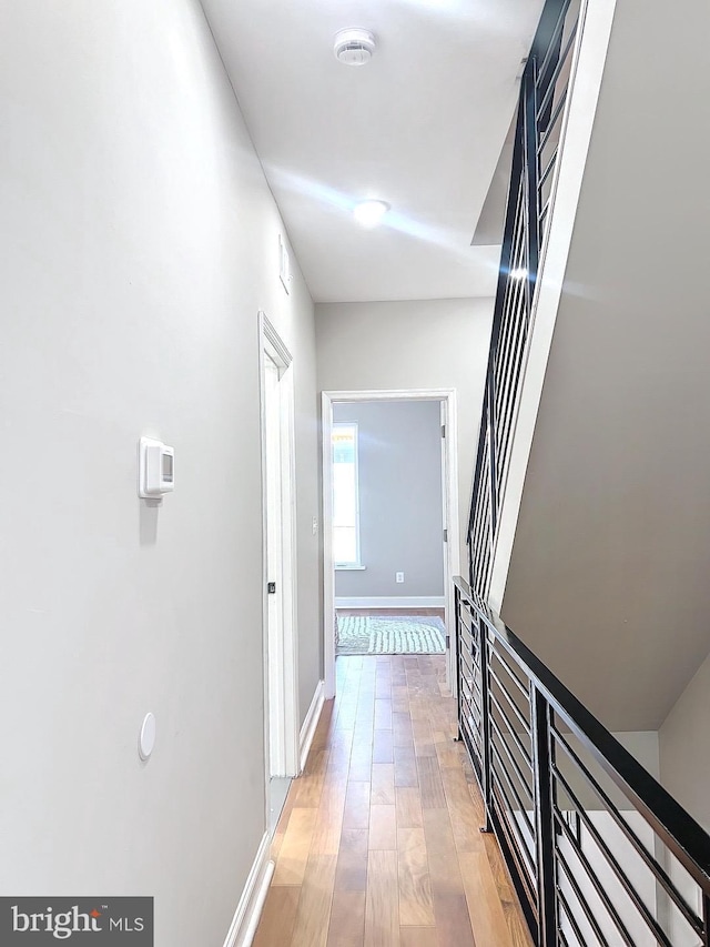 hallway featuring light hardwood / wood-style flooring