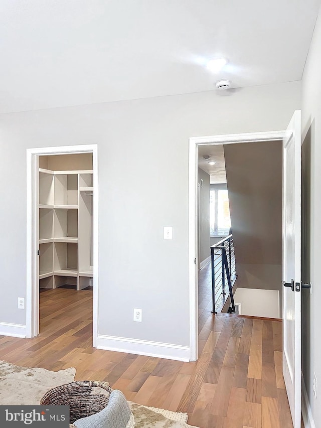 interior space with hardwood / wood-style floors