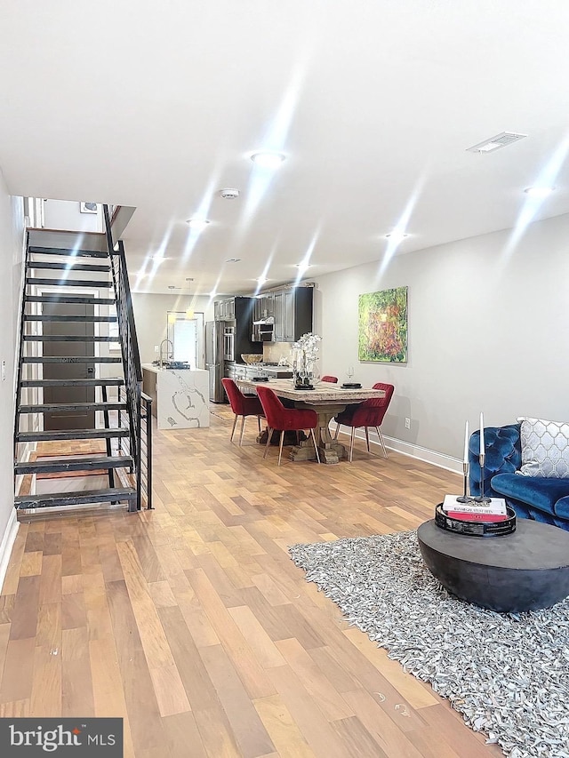 interior space with hardwood / wood-style floors