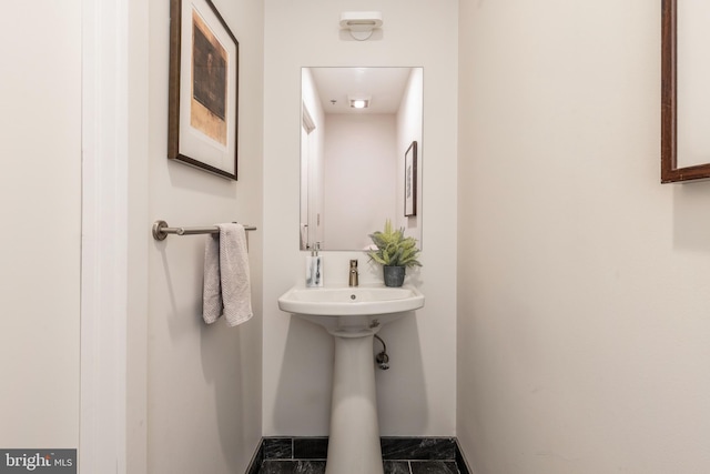 bathroom with baseboards