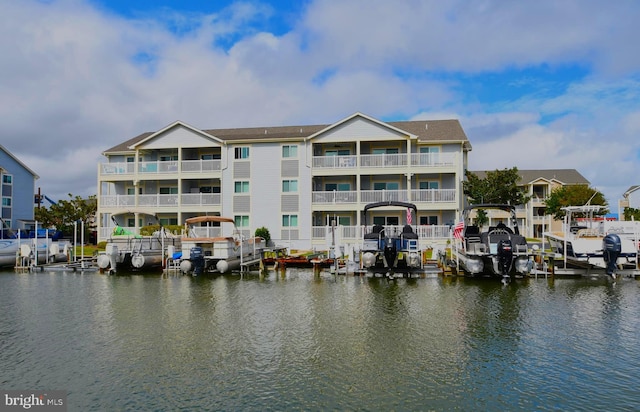 property view of water with a dock