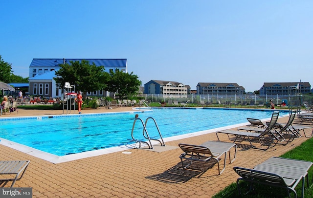 view of pool featuring a patio area