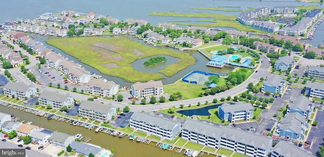 bird's eye view with a water view