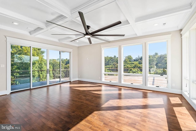 spare room with hardwood / wood-style flooring, plenty of natural light, and ceiling fan