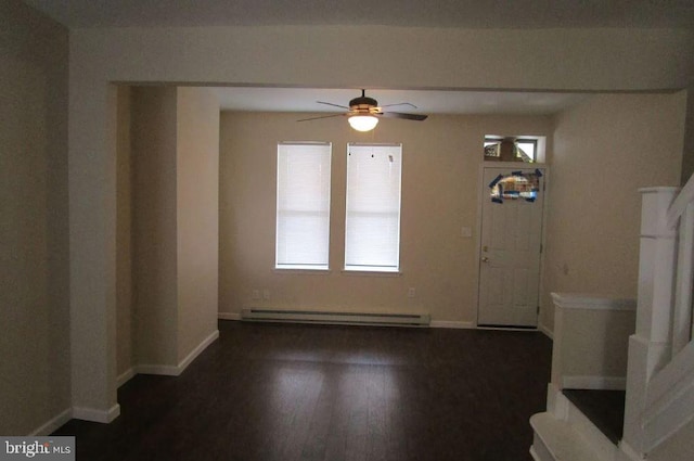 entryway featuring ceiling fan, baseboard heating, and dark hardwood / wood-style floors