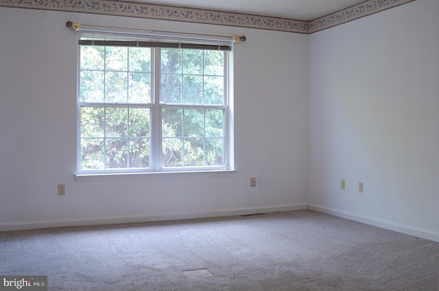 view of carpeted spare room