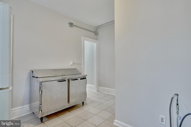 interior space featuring light tile patterned flooring