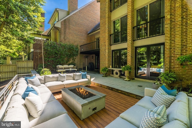 714 Belgrove Rd, Mclean, VA 22101 - view of patio featuring french doors and an outdoor living space with a fire pit