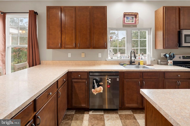 kitchen featuring sink and appliances with stainless steel finishes