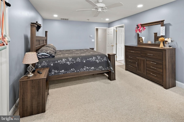 carpeted bedroom with ceiling fan