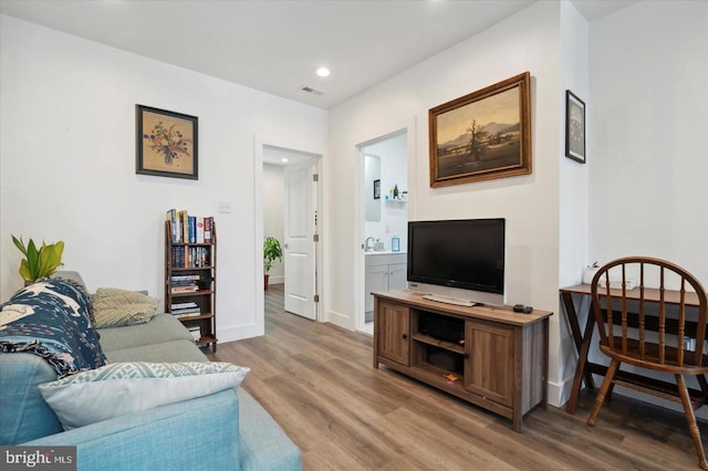 living room with hardwood / wood-style floors