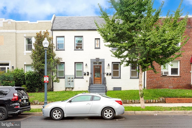 view of front facade with cooling unit