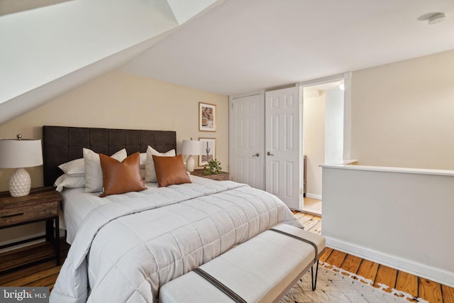 bedroom with wood-type flooring