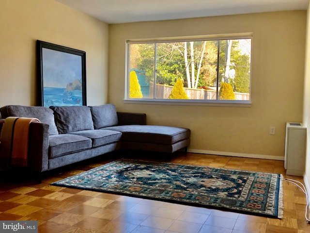 living room with a healthy amount of sunlight