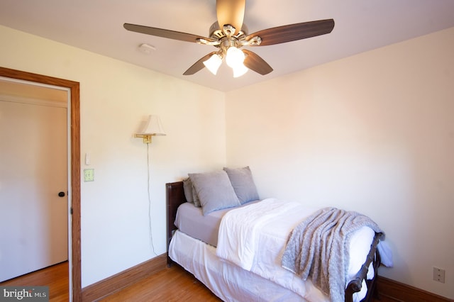 bedroom featuring wood-type flooring and ceiling fan