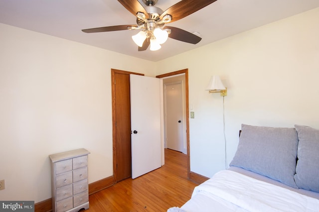 bedroom featuring ceiling fan and light hardwood / wood-style flooring