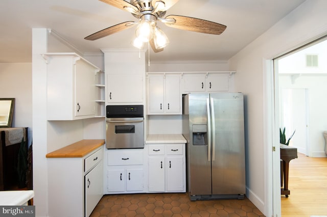 kitchen featuring crown molding, white cabinetry, stainless steel appliances, and ceiling fan