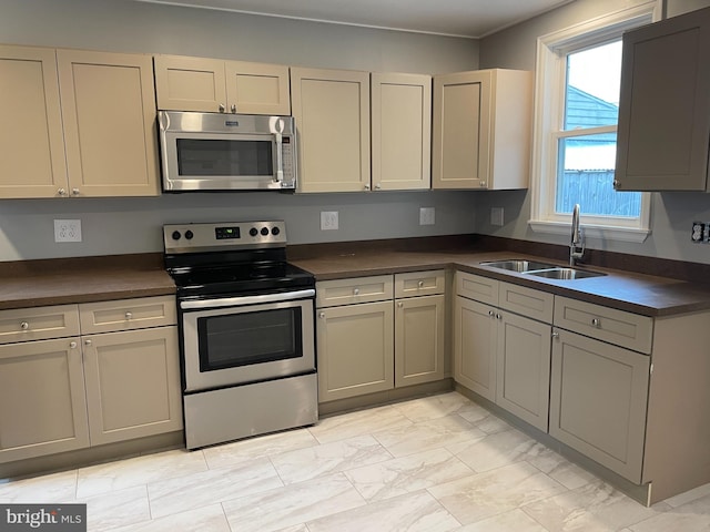 kitchen featuring stainless steel appliances and sink