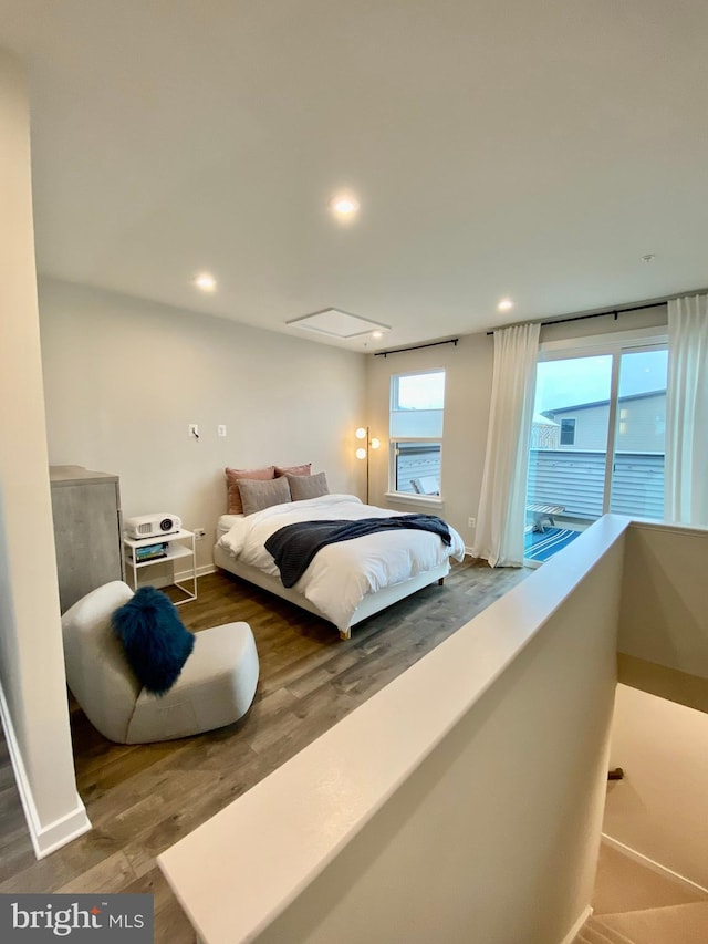 bedroom with wood-type flooring