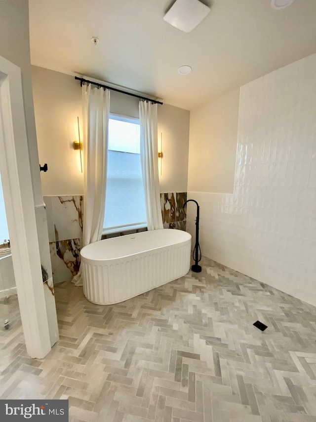 bathroom with a bathing tub