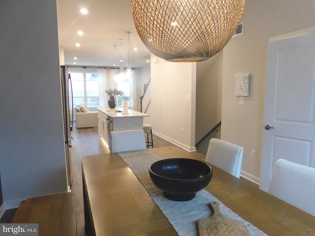 dining room featuring light wood-type flooring