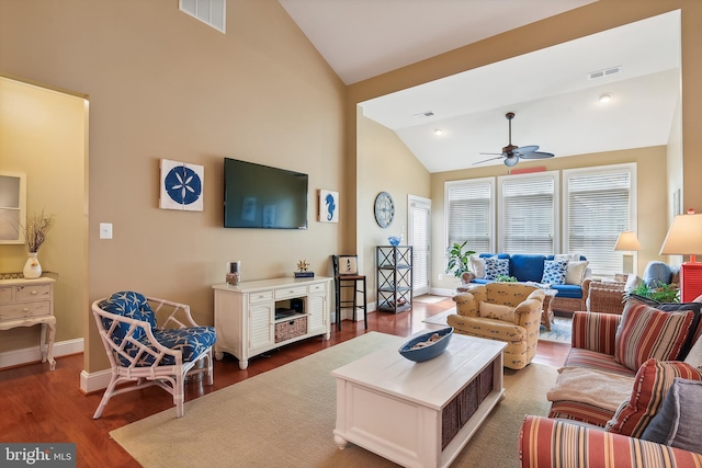 living room with dark hardwood / wood-style floors, high vaulted ceiling, and ceiling fan