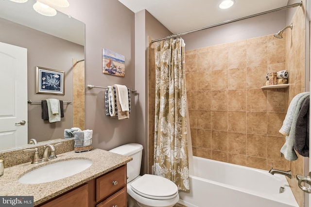 full bathroom with shower / tub combo, vanity, and toilet